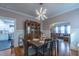 Open dining room with a view of the kitchen and living room at 404 Glenwood Ave, Burlington, NC 27215