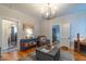 Inviting living room with hardwood floors and views into other rooms at 404 Glenwood Ave, Burlington, NC 27215