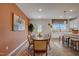 Bright dining area with a wooden table, chairs, and an accent wall at 4115 Bryson Dr # 101, Durham, NC 27703