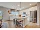 Modern kitchen with white cabinets, stainless steel appliances, and an island at 4115 Bryson Dr # 101, Durham, NC 27703