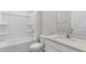 Bathroom with a tub, toilet, and vanity with a quartz countertop at 425 Ashley Run, Sanford, NC 27330
