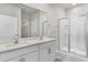 Double vanity bathroom with a large shower at 425 Ashley Run, Sanford, NC 27330