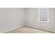 Cozy bedroom with window and neutral decor at 425 Ashley Run, Sanford, NC 27330