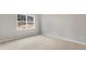 Bright bedroom featuring neutral walls and carpet at 425 Ashley Run, Sanford, NC 27330