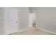 Well-lit bedroom with access to another room at 425 Ashley Run, Sanford, NC 27330