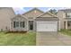 Craftsman style home with stone accents and a two-car garage at 425 Ashley Run, Sanford, NC 27330