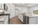 Kitchen boasting an island, granite counters and stainless steel appliances at 425 Ashley Run, Sanford, NC 27330