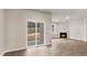 Living room with fireplace and sliding glass doors at 425 Ashley Run, Sanford, NC 27330