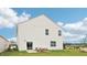 House exterior showcasing a patio and spacious backyard at 6433 Alfalfa Ln, Wake Forest, NC 27587