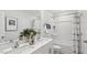 Bathroom with tub and shower, double vanity with quartz countertop at 6433 Alfalfa Ln, Wake Forest, NC 27587