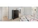 Bedroom with a dresser and view into another room at 6433 Alfalfa Ln, Wake Forest, NC 27587
