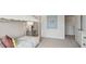 Charming bedroom with a unique bed frame and access to hallway at 6433 Alfalfa Ln, Wake Forest, NC 27587