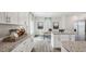 Well-designed kitchen with granite countertops and white cabinets at 6433 Alfalfa Ln, Wake Forest, NC 27587