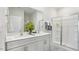 Clean bathroom with double vanity and glass shower at 6441 Alfalfa Ln, Wake Forest, NC 27587