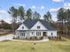 Stunning aerial view of a two-story house with a landscaped yard at 2637 Trifle Ln, Wake Forest, NC 27587