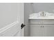 Elegant powder room with marble countertop and gold fixtures at 2637 Trifle Ln, Wake Forest, NC 27587