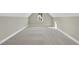 Bright bedroom with carpet, dormer window, and ample natural light at 2637 Trifle Ln, Wake Forest, NC 27587