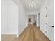 Elegant hallway with hardwood floors and recessed lighting at 2637 Trifle Ln, Wake Forest, NC 27587
