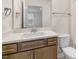 Modern bathroom with vanity, toilet and shower at 280 Umstead St, Sanford, NC 27330