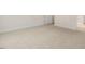 Well-lit bedroom with neutral carpeting and ample space at 280 Umstead St, Sanford, NC 27330