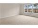Spacious bedroom with large windows and carpet at 280 Umstead St, Sanford, NC 27330