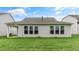 Rear view of house showcasing backyard at 280 Umstead St, Sanford, NC 27330