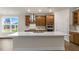 Modern kitchen with an island, stainless steel appliances, and wood cabinets at 280 Umstead St, Sanford, NC 27330