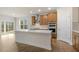 Modern kitchen with an island, stainless steel appliances, and wood cabinets at 280 Umstead St, Sanford, NC 27330