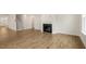 Living room features hardwood floors, a fireplace, and plenty of natural light at 280 Umstead St, Sanford, NC 27330