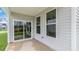 Covered patio with sliding glass door access at 280 Umstead St, Sanford, NC 27330