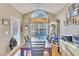 Bright dining area with wood table and access to backyard at 513 Woodson Dr, Clayton, NC 27527