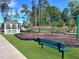 Community playground with swings, gazebo, and bench at 7141 Hubner Pl # 31, Cary, NC 27519