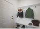 Bright entryway with built-in bench, cubbies, and coat hooks at 8740 Maxine St # 7 Selma, Willow Springs, NC 27592