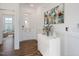 Spacious foyer with white walls, hardwood floors, and decorative accents at 8740 Maxine St # 7 Selma, Willow Springs, NC 27592