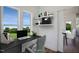 Home office with built-in shelves and view of the backyard at 8740 Maxine St # 7 Selma, Willow Springs, NC 27592