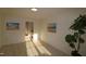 Spacious bedroom with laminate flooring and access to the bathroom at 11331 Involute Pl # 100, Raleigh, NC 27617