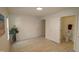 Bright bedroom with hardwood floors, and en-suite bathroom access at 11331 Involute Pl # 100, Raleigh, NC 27617