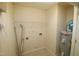 Laundry room with shelving, water heater, and dryer vent at 11331 Involute Pl # 100, Raleigh, NC 27617