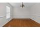 Dining room with hardwood floors and chandelier at 1204 Breedlove Rd, Nashville, NC 27856