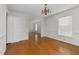 Dining room with hardwood floors and chandelier at 1204 Breedlove Rd, Nashville, NC 27856