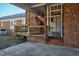Brick patio with steps leading to a wooden deck at 1204 Breedlove Rd, Nashville, NC 27856