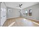 Spacious bedroom with hardwood floors and large windows at 154 Leatherwood Ln, Chapel Hill, NC 27517