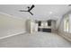 Large bonus room with wet bar and carpeted floors at 154 Leatherwood Ln, Chapel Hill, NC 27517