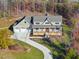 Two-story house with a three-car garage and a long driveway at 154 Leatherwood Ln, Chapel Hill, NC 27517