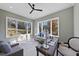 Sunlit home office with built-in desk and views of the backyard at 154 Leatherwood Ln, Chapel Hill, NC 27517
