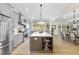 Open concept kitchen with large island and dining area at 154 Leatherwood Ln, Chapel Hill, NC 27517