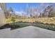 Landscaped backyard with stone retaining wall at 154 Leatherwood Ln, Chapel Hill, NC 27517