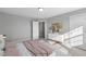 Spacious bedroom with a view and plenty of natural light at 8749 Maxine St # 11 Holly, Willow Springs, NC 27592