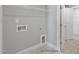 Convenient laundry room with shelving at 8749 Maxine St # 11 Holly, Willow Springs, NC 27592