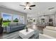 Open floor plan with living room, kitchen, and dining area at 8749 Maxine St # 11 Holly, Willow Springs, NC 27592
